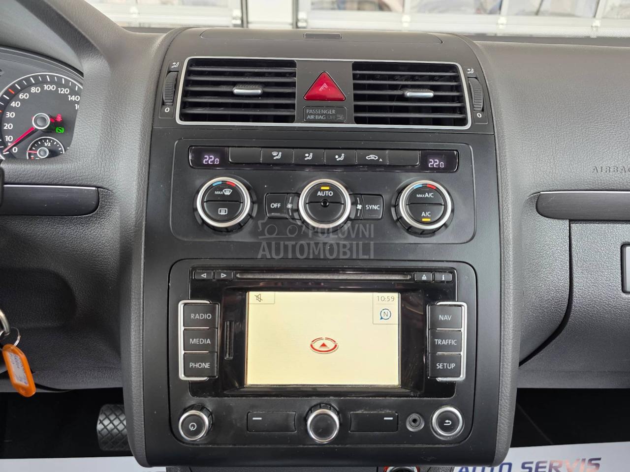 Volkswagen Touran 1.6 TDI DSG 7 sed